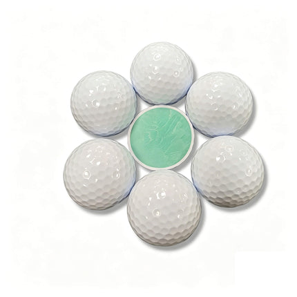 Close-up of Eliteshine 2-piece Surlyn golf ball dimple pattern, white Surlyn cover