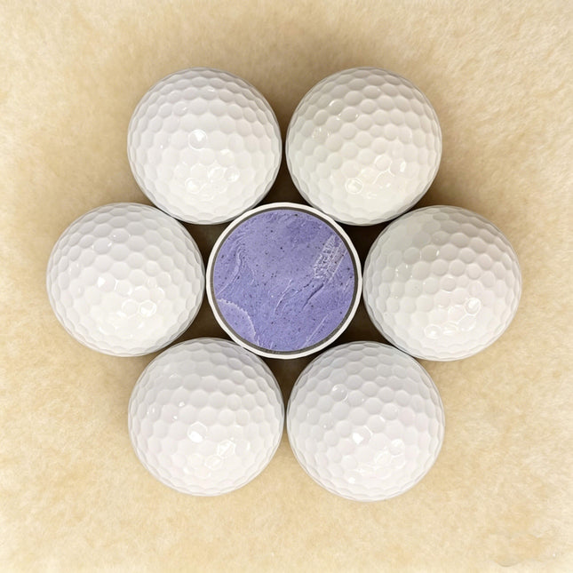 Close-up of Eliteshine 3-piece Surlyn tournament golf ball dimple pattern and cover