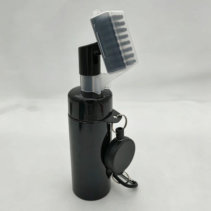 Eliteshine F01 golf brush in black showing hard plastic groove cleaner head tilted open on water dispenser bottle with retractable cord and carabiner