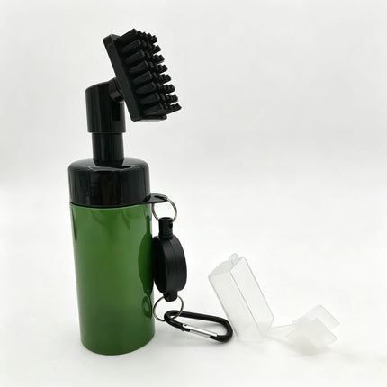 Rear view of Eliteshine F01 golf brush in green showing groove cleaner head tilted open, retractable cord reel, and carabiner clip on bottle body