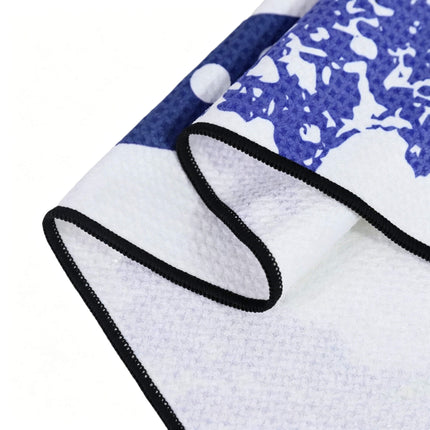 Close-up detail of Eliteshine MH-B golf towel showing waffle cotton texture, vibrant single-side digital print, and reinforced black overlock edge