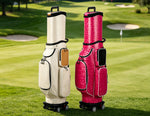 Eliteshine golf travel bag of crystal PU with tan leather accents, swivel wheels and retractable hood, stand on golf green