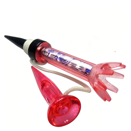 Bottom view of Eliteshine T105 magnetic golf tee showing black spike tip and rubber cap base detail
