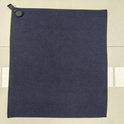 Eliteshine MH-E diagonal pocket golf towel in black square format — waffle cotton with magnetic button and karabiner clip on wooden surface